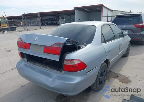 1999 Honda Accord Lx z USA, uszkodzony, nr VIN 1HGCG5648XA132266